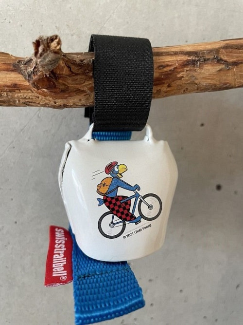 swisstrailbell Bikeglocke weiss Globi auf Mountainbike Band hellblau